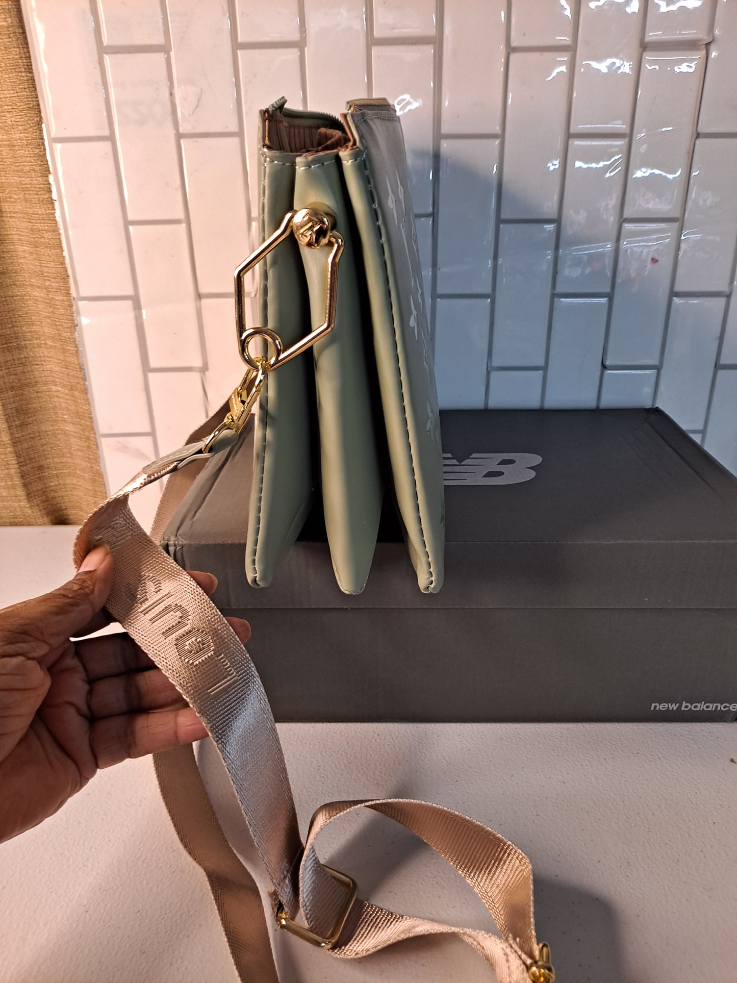 NB SNEAKERS OR LV CROSSBODY BAG
