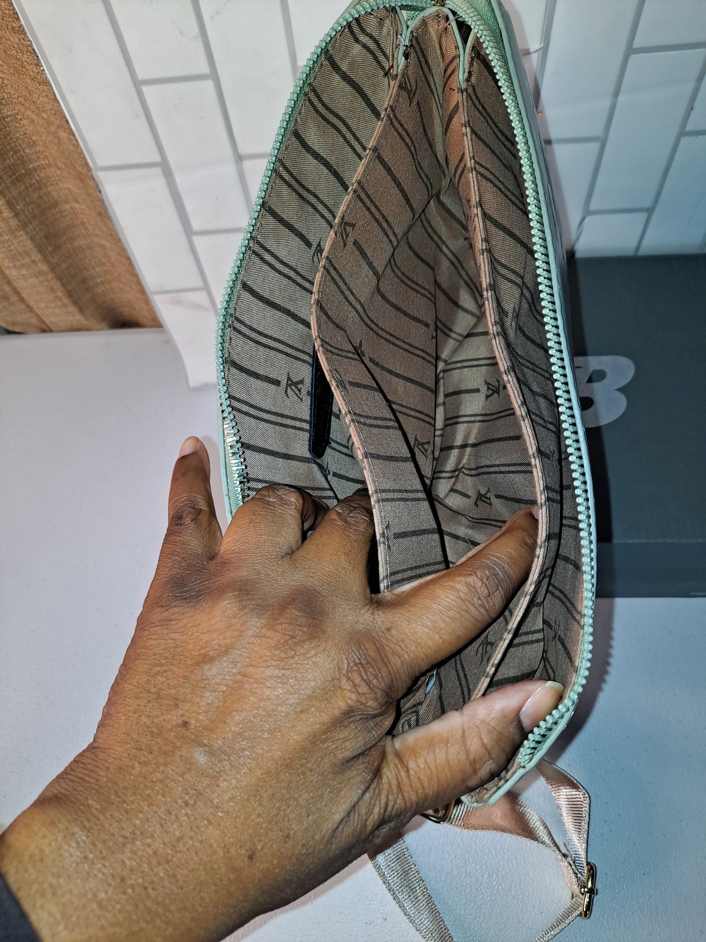 NB SNEAKERS OR LV CROSSBODY BAG