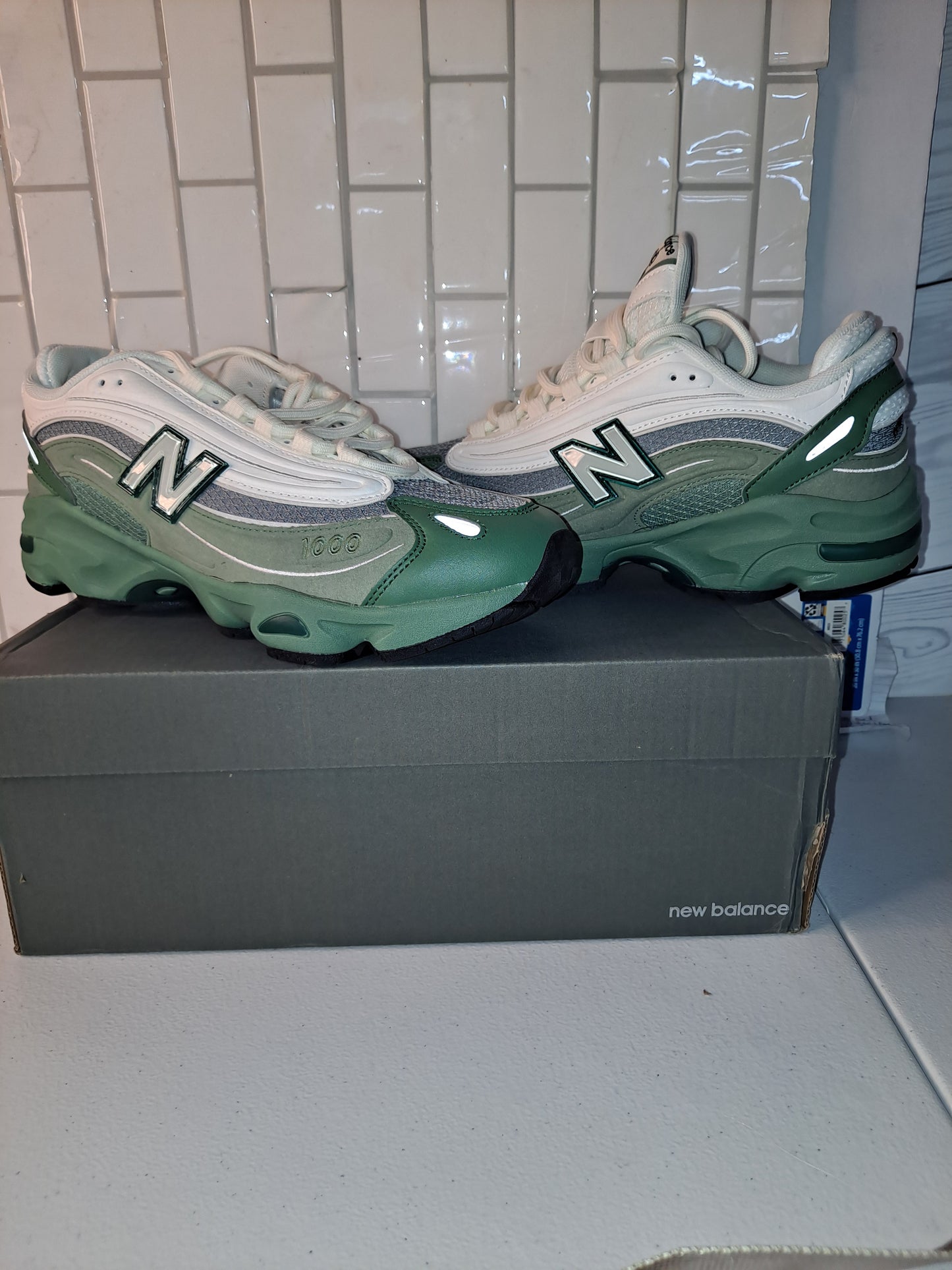 NB SNEAKERS OR LV CROSSBODY BAG