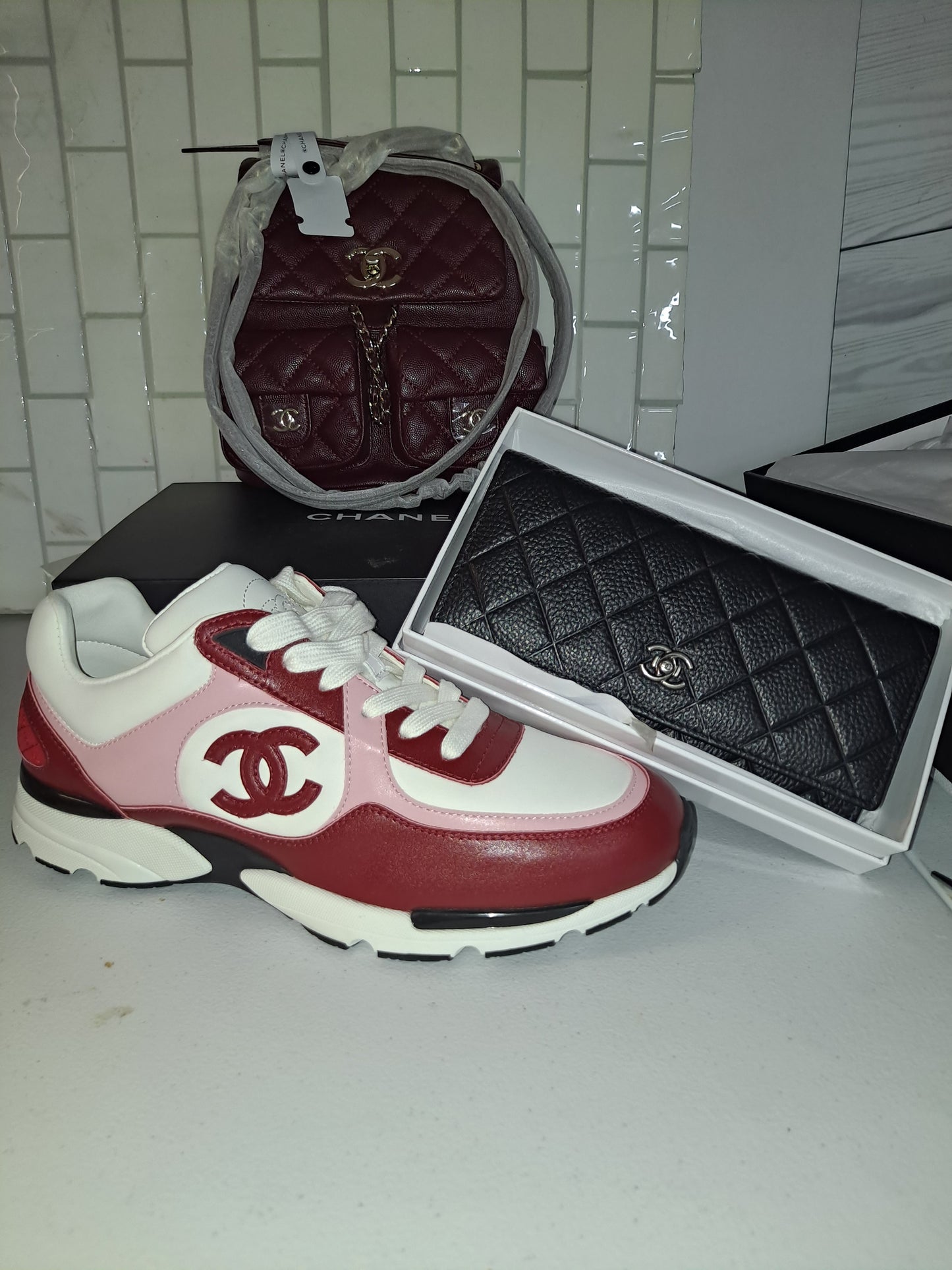 CC SNEAKERS OR CC BACKPACK/CROSSBODY BAG OR WALLET