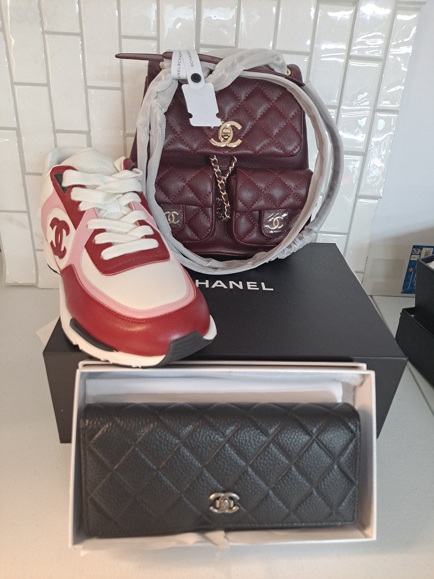 CC SNEAKERS OR CC BACKPACK/CROSSBODY BAG OR WALLET