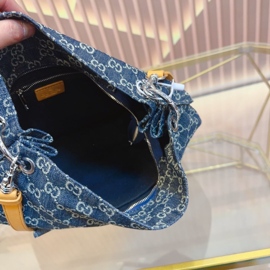 GG DENIM BUCKET/CROSSBODY BAG 73240135