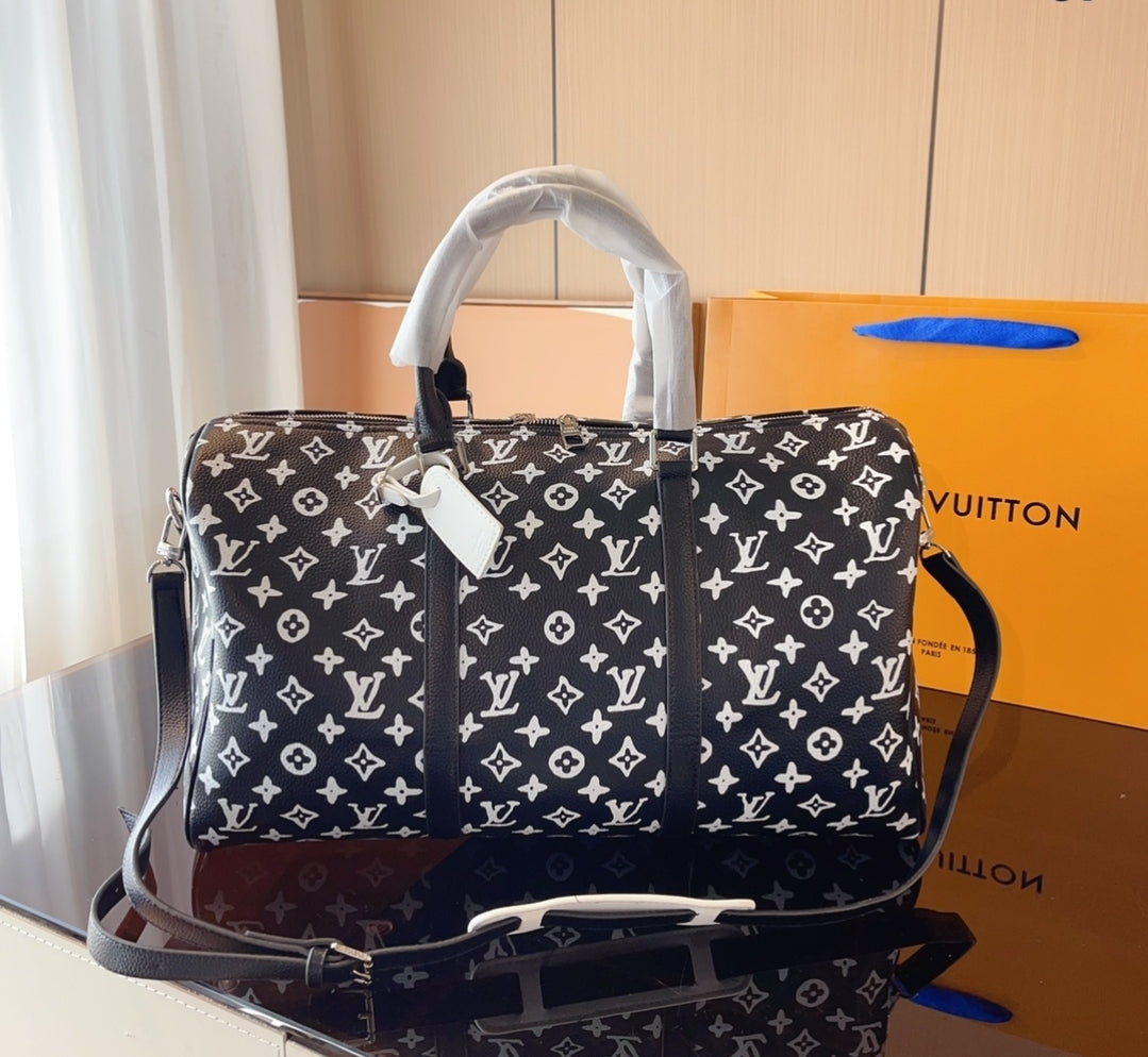 LV BLACK & WHITE DUFFLE BAG 73240170
