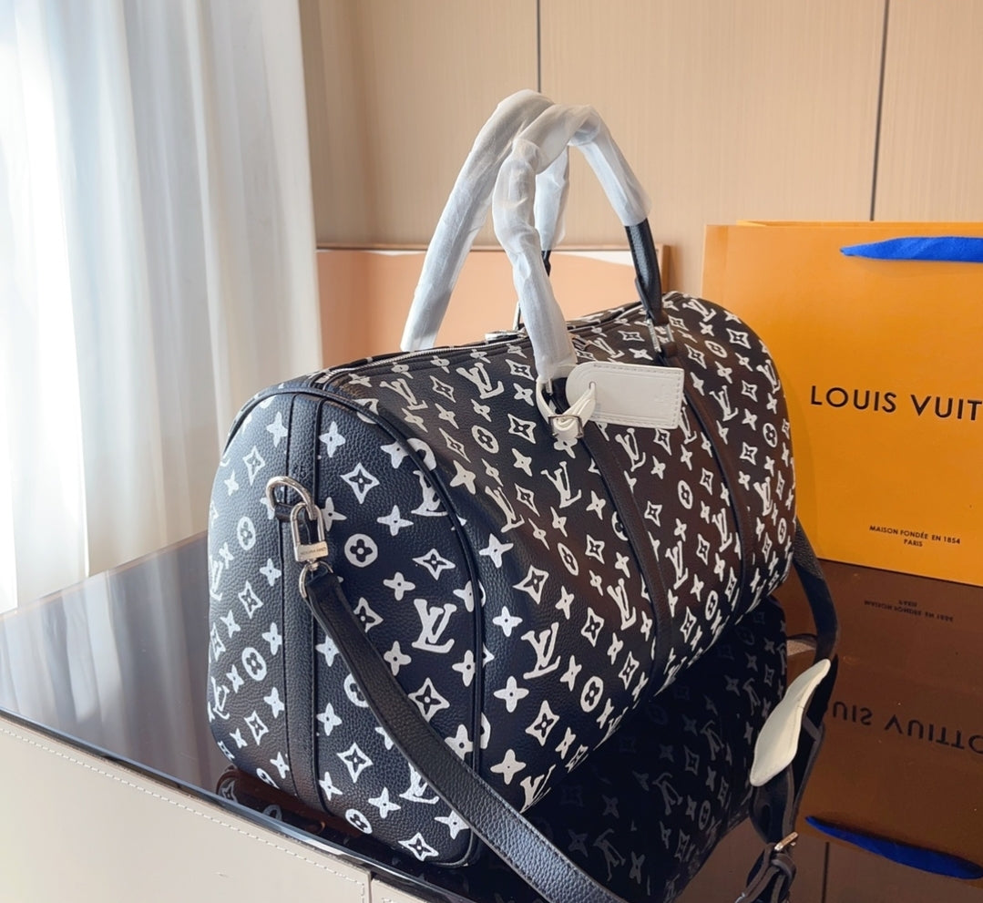 LV BLACK & WHITE DUFFLE BAG 73240170