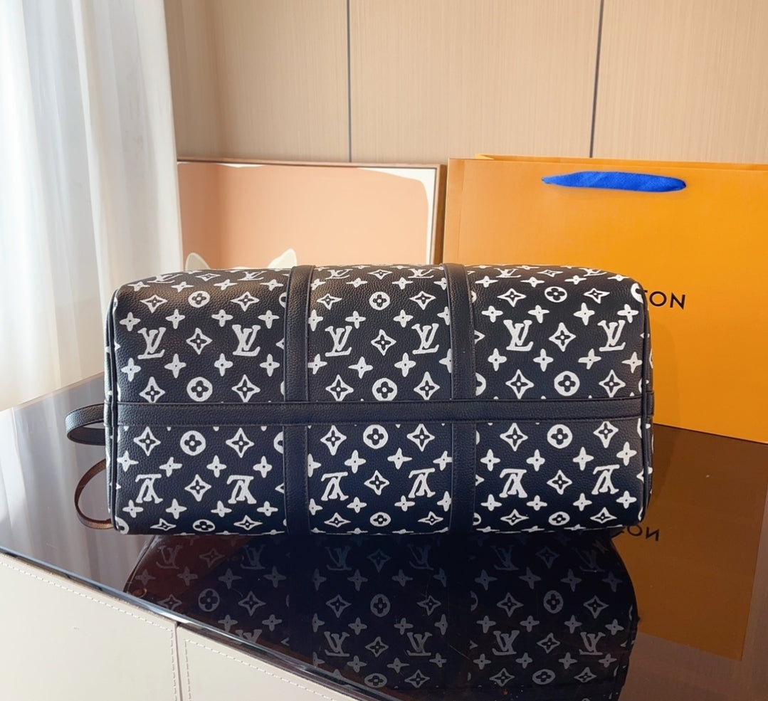 LV BLACK & WHITE DUFFLE BAG 73240170