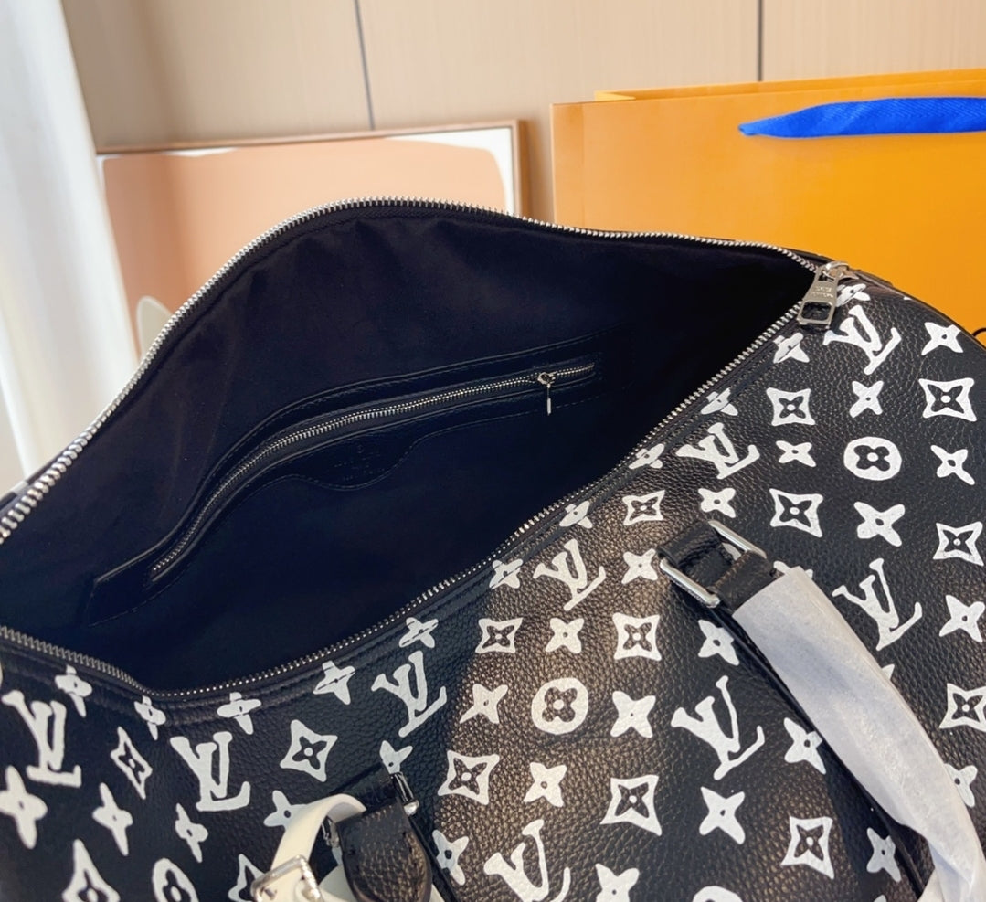 LV BLACK & WHITE DUFFLE BAG 73240170