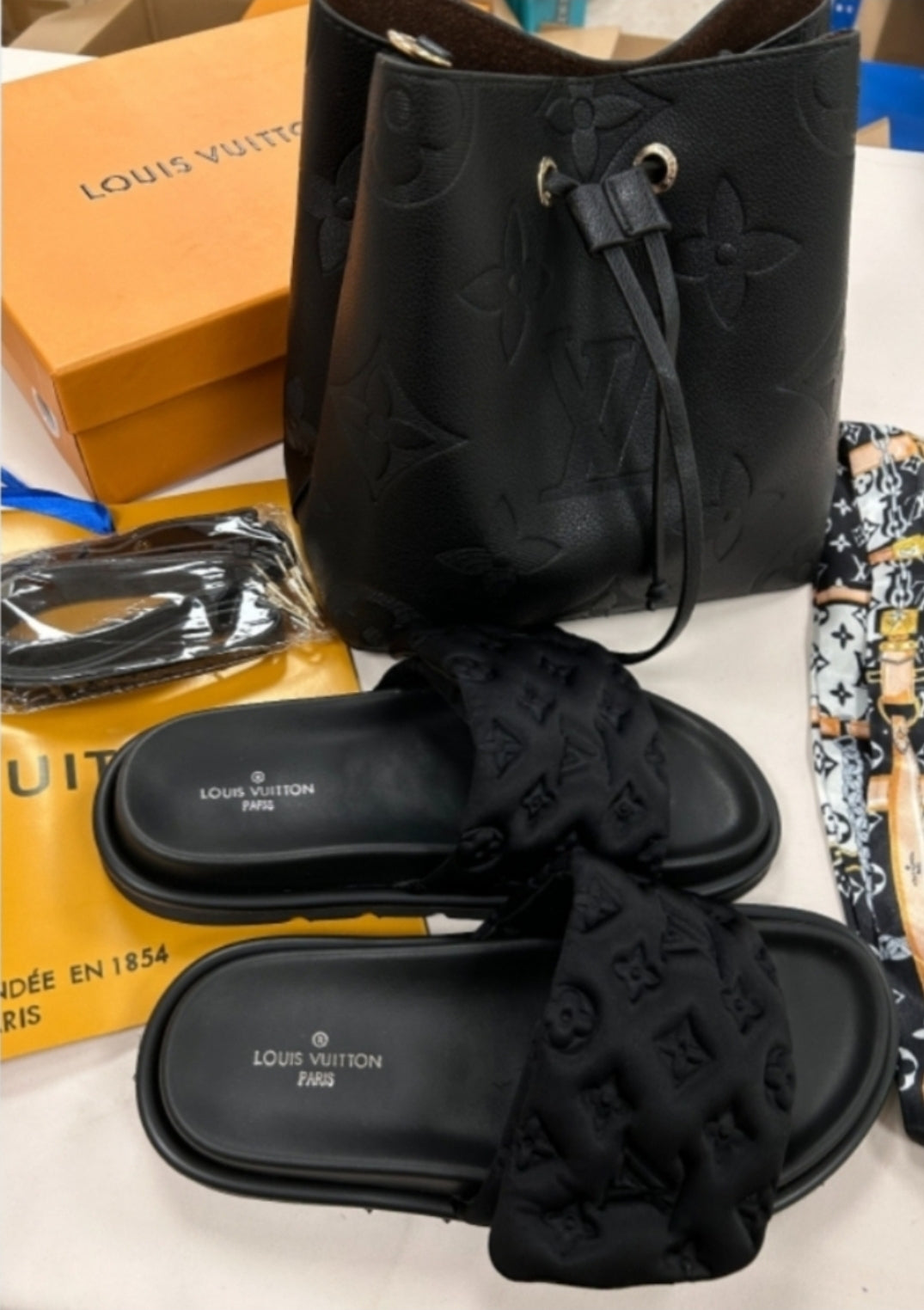 LV SLIDES OR LV CROSSBODY BAG