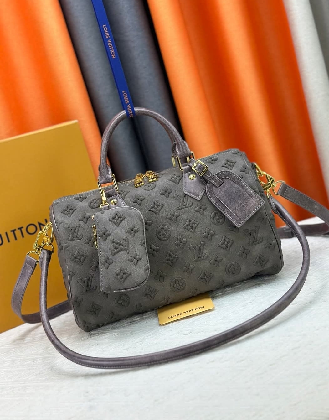 LV EMBOSSED CROSSBODY BAGS
