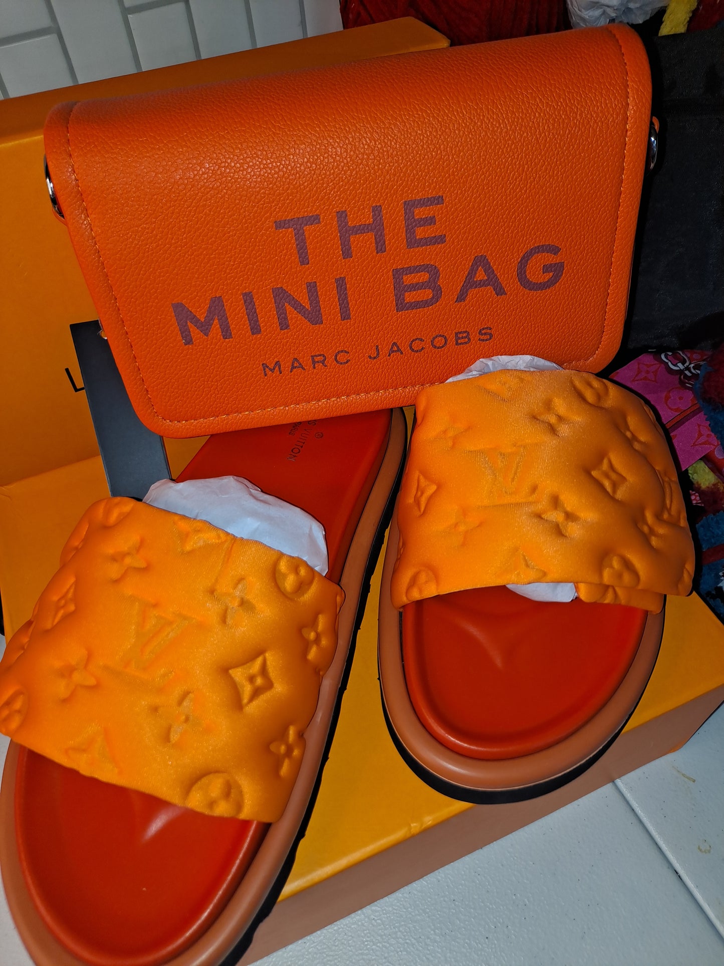 LV SLIDES OR MJ MINI CROSSBODY BAG