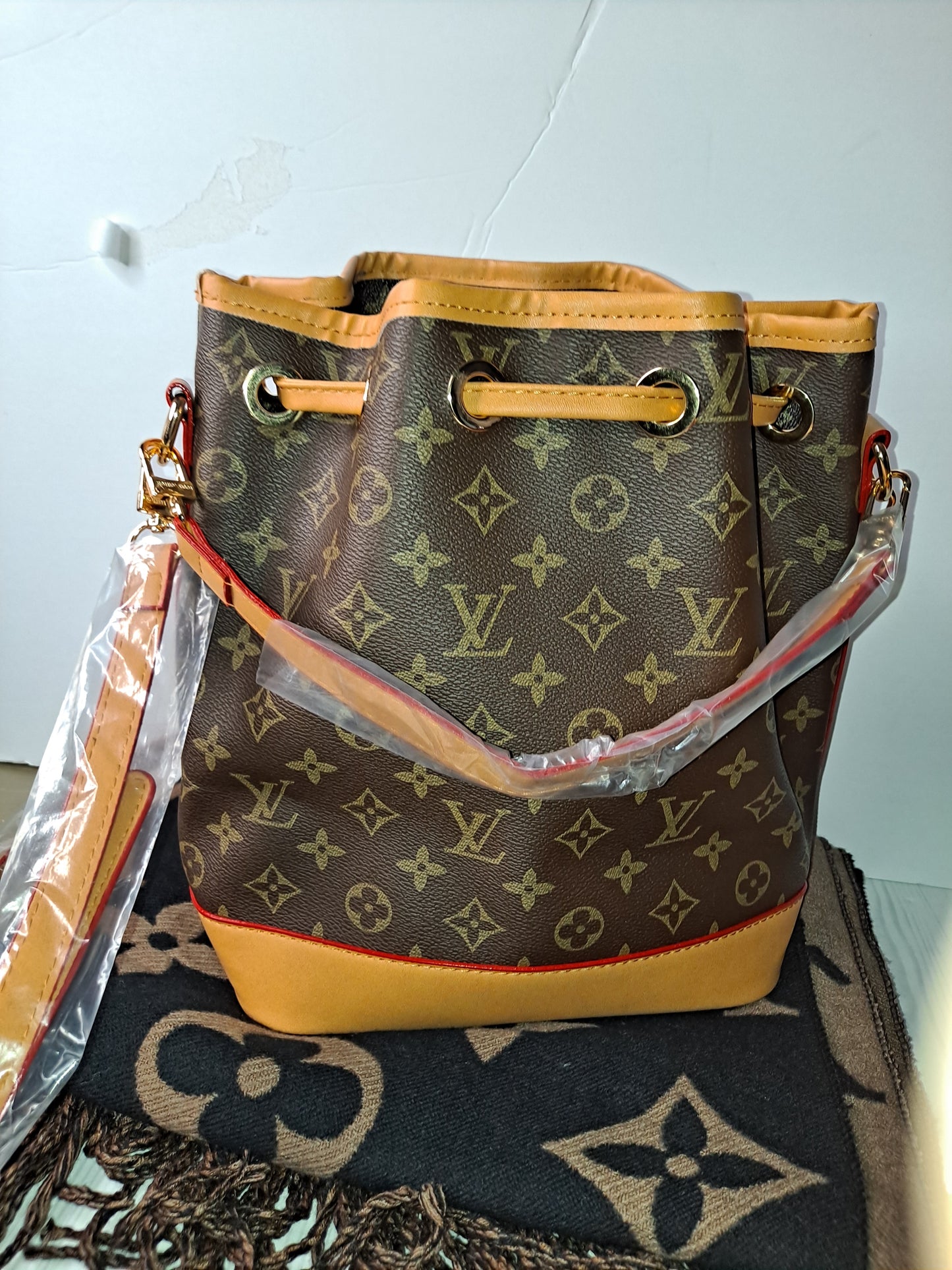 ON HAND LV BUCKET BAG, WALLET, SCARF