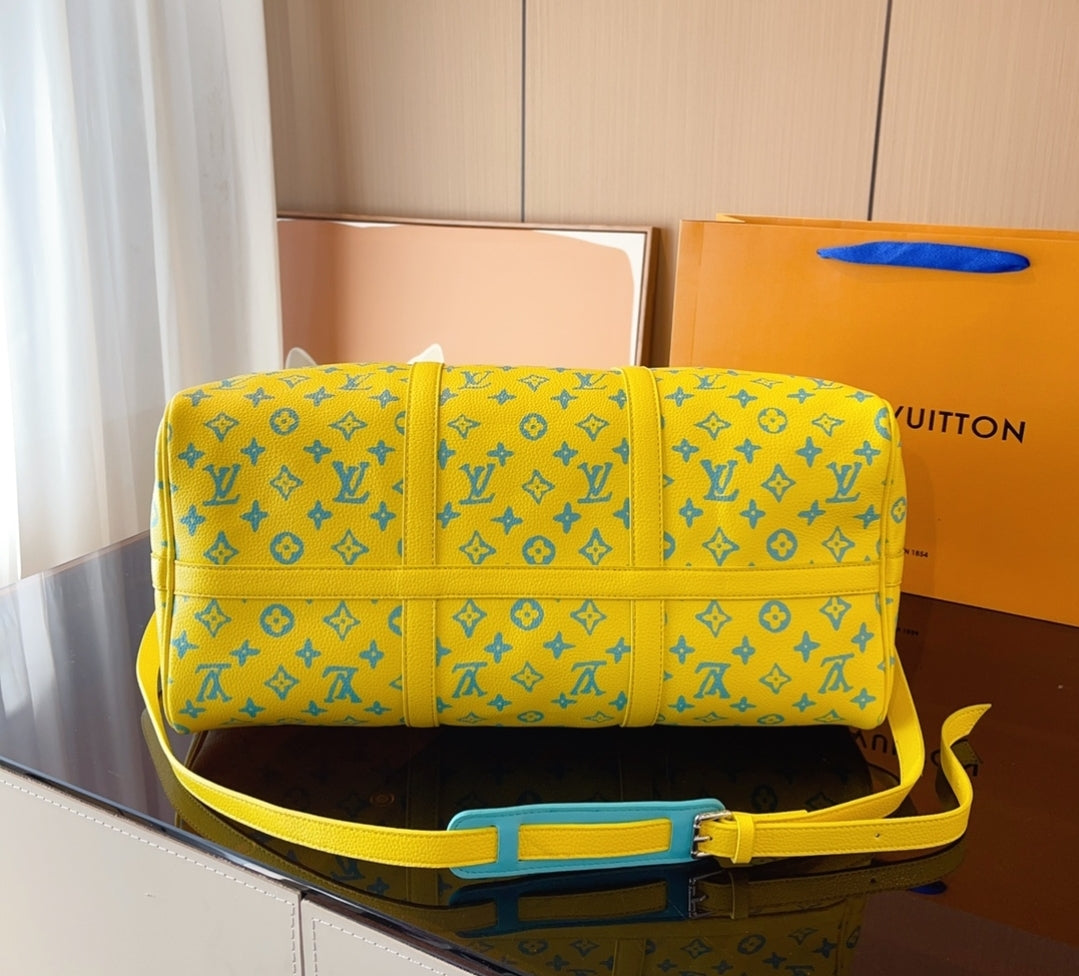 LV YELLOW DUFFLE 73240170