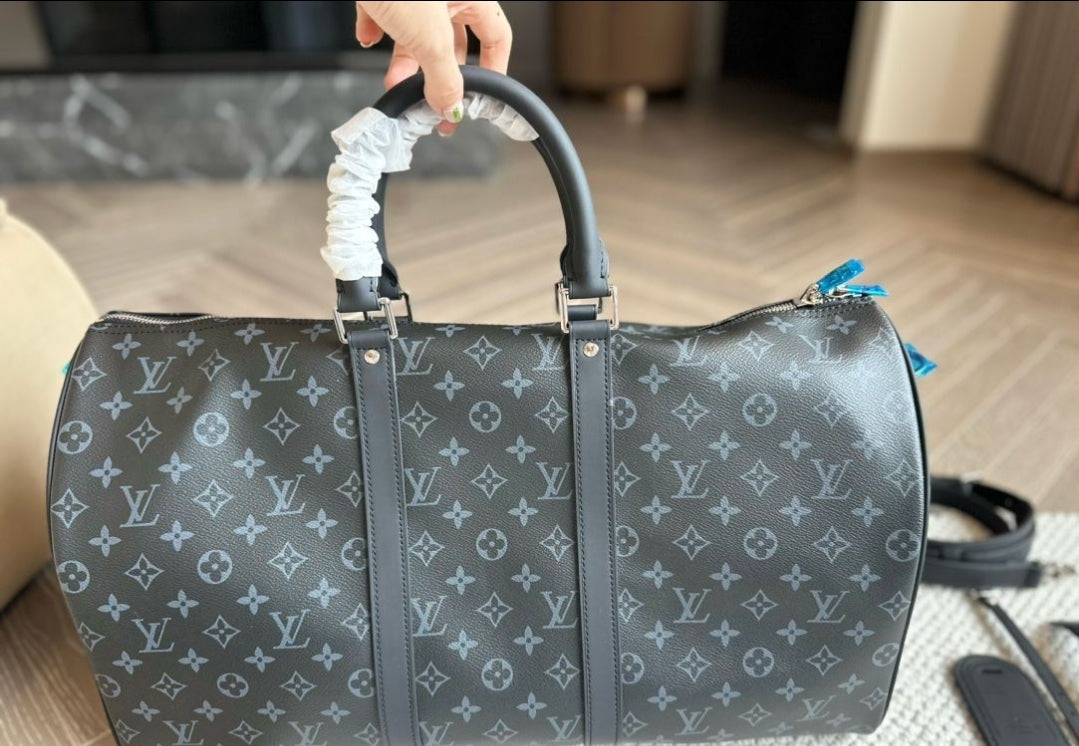 LV DUFFEL BAGS