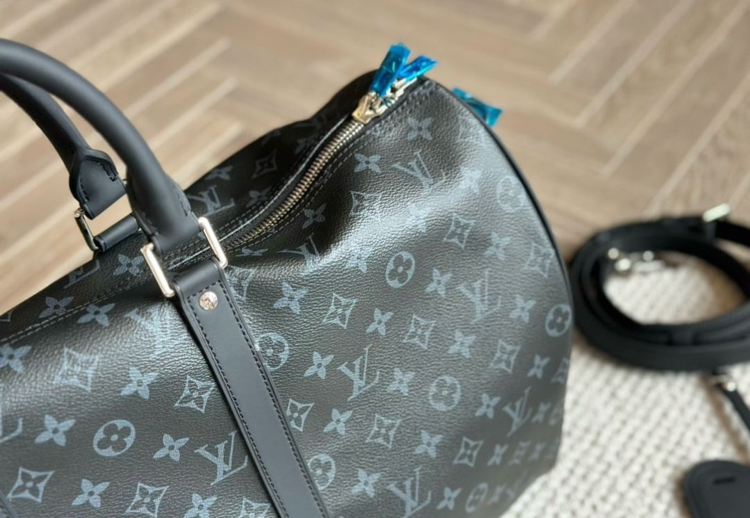 LV DUFFEL BAGS