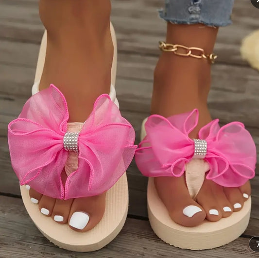 PINK BOW FLIP FLOPS