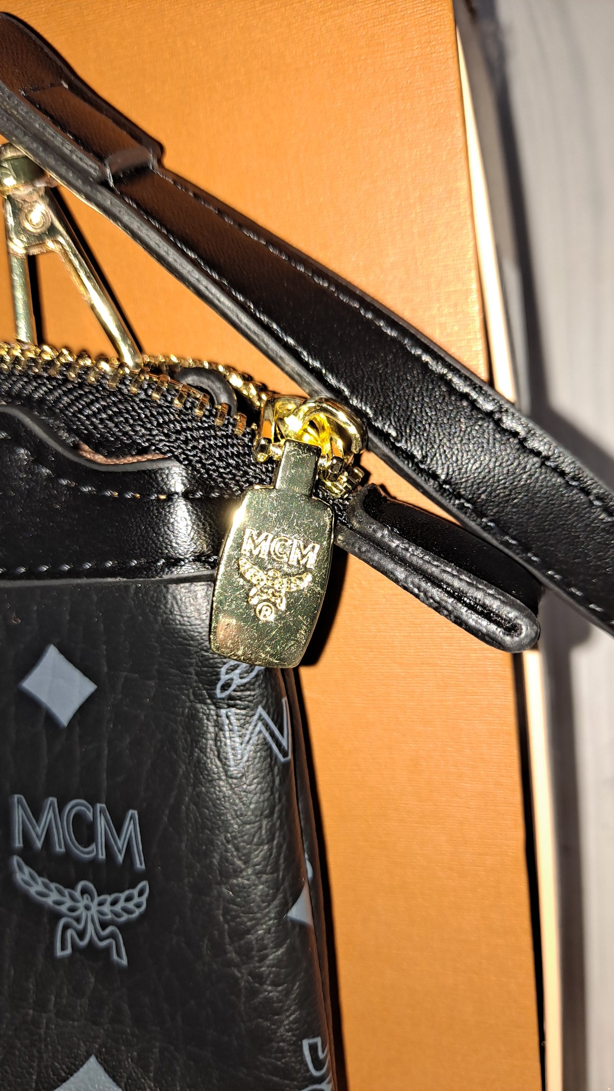 M(M BLACK FLAT CROSSBODY BAG