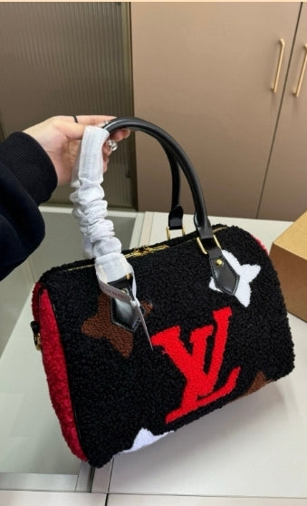 LV FUR BAG