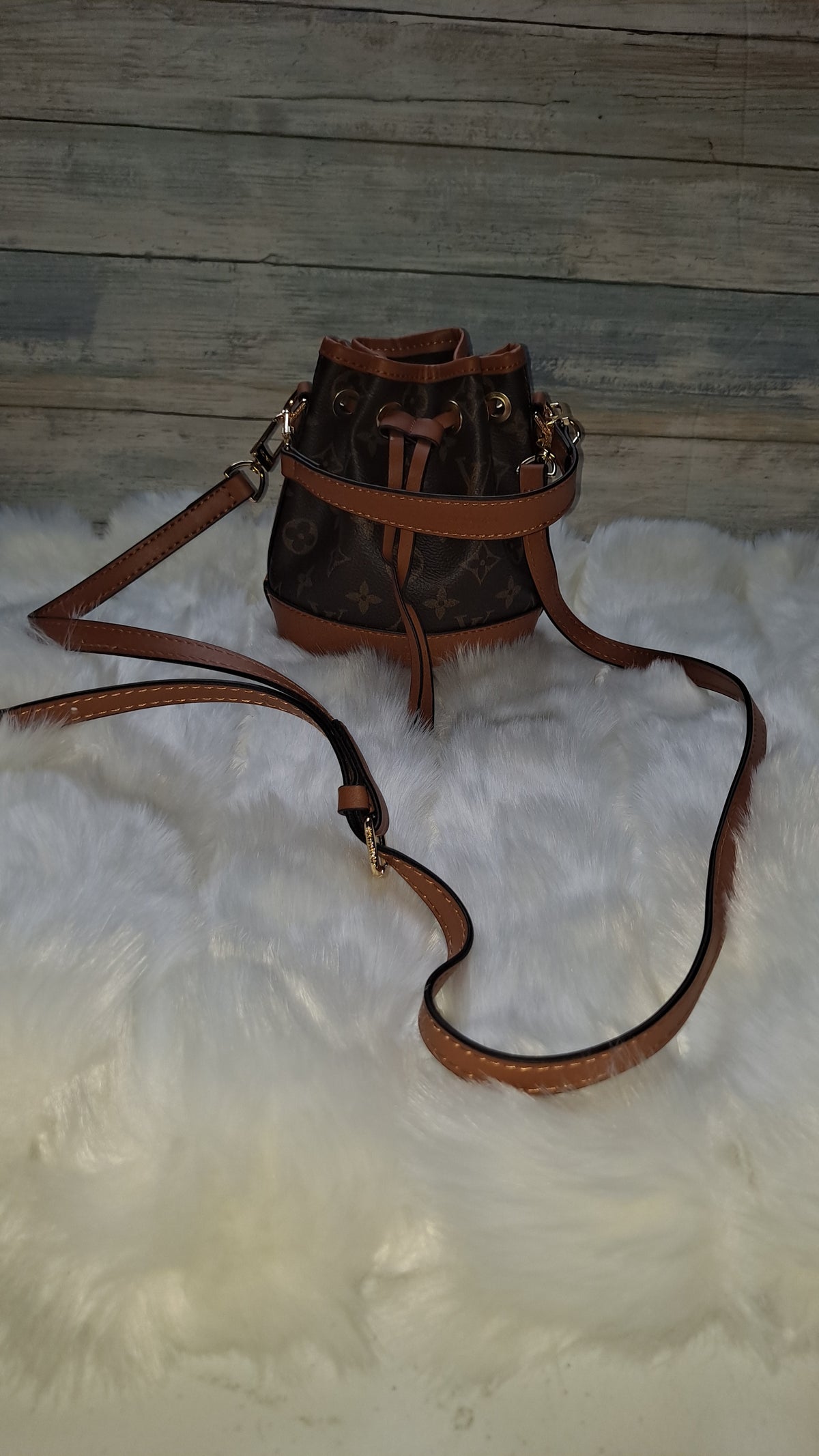 LOUISV MINI BUCKET CROSSBODY BAG