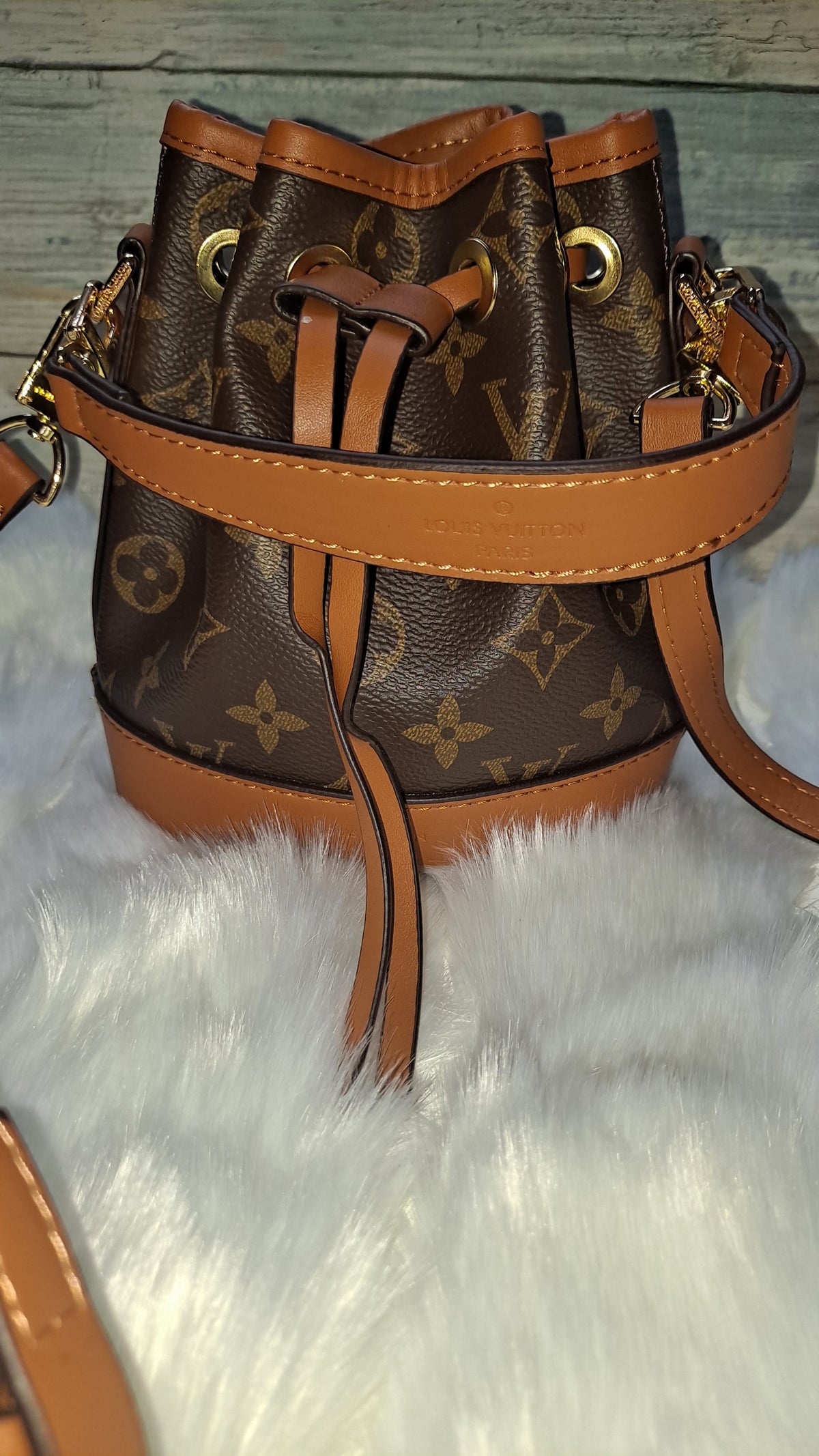 LOUISV MINI BUCKET CROSSBODY BAG