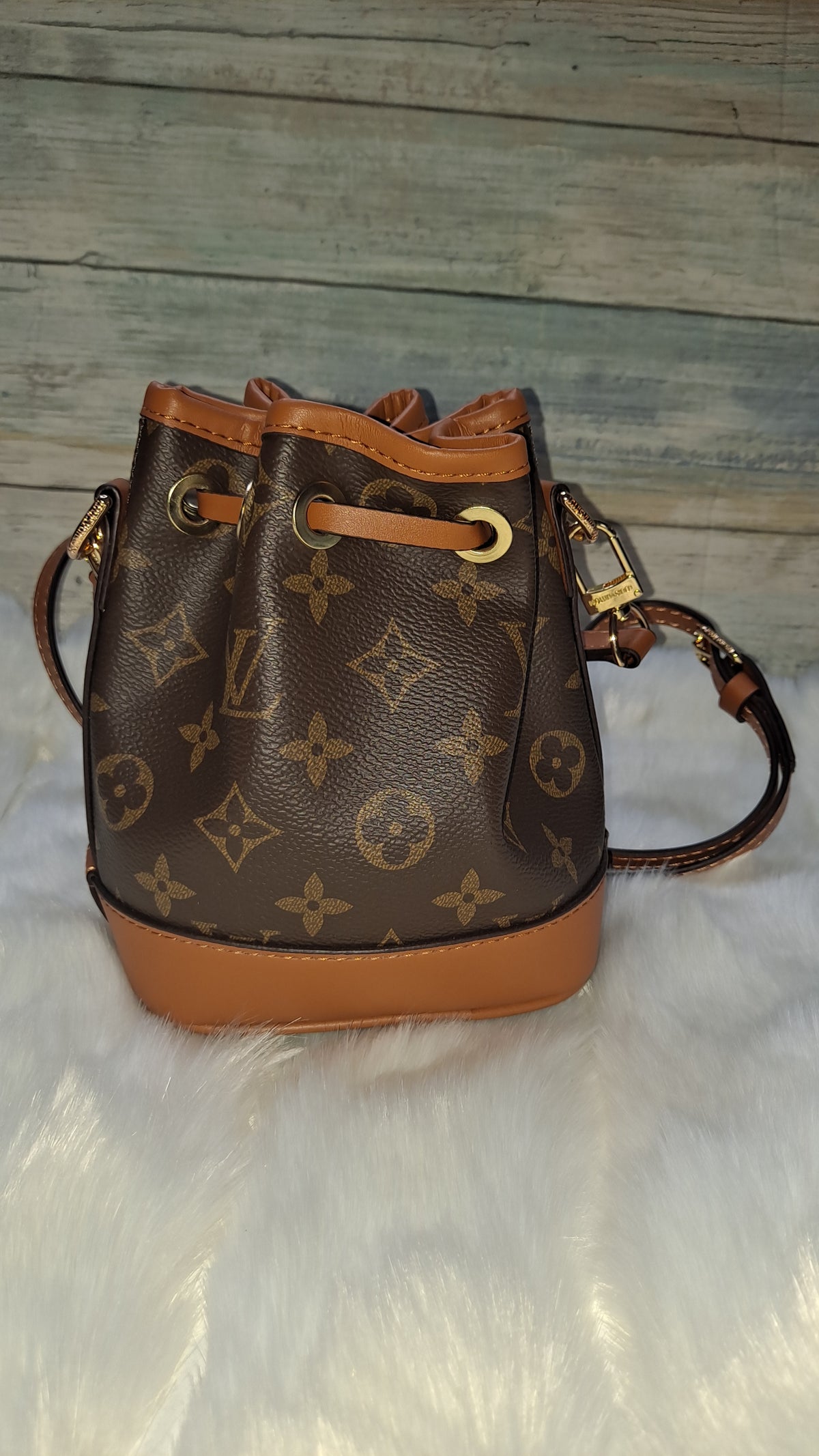 LOUISV MINI BUCKET CROSSBODY BAG