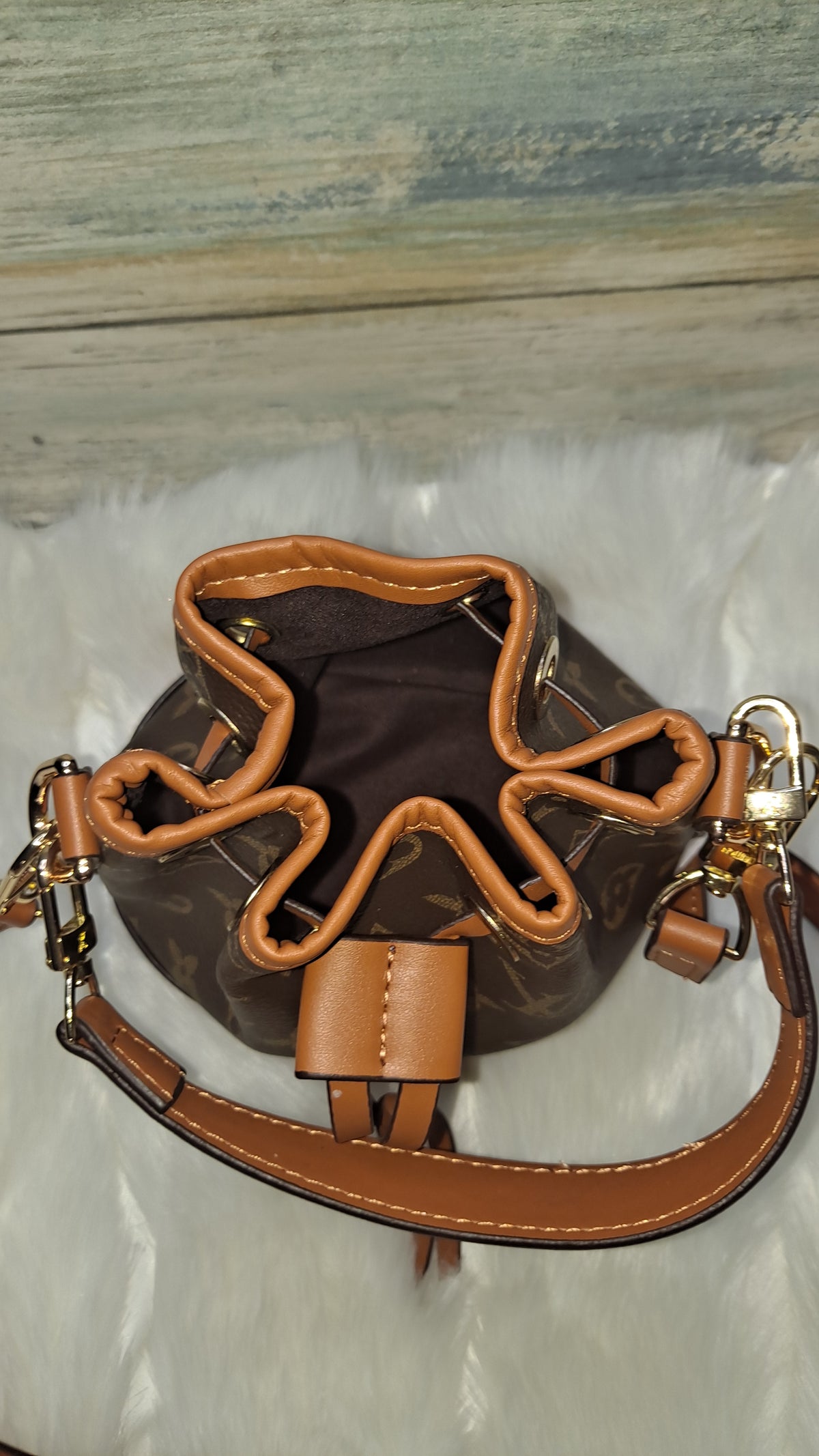 LOUISV MINI BUCKET CROSSBODY BAG