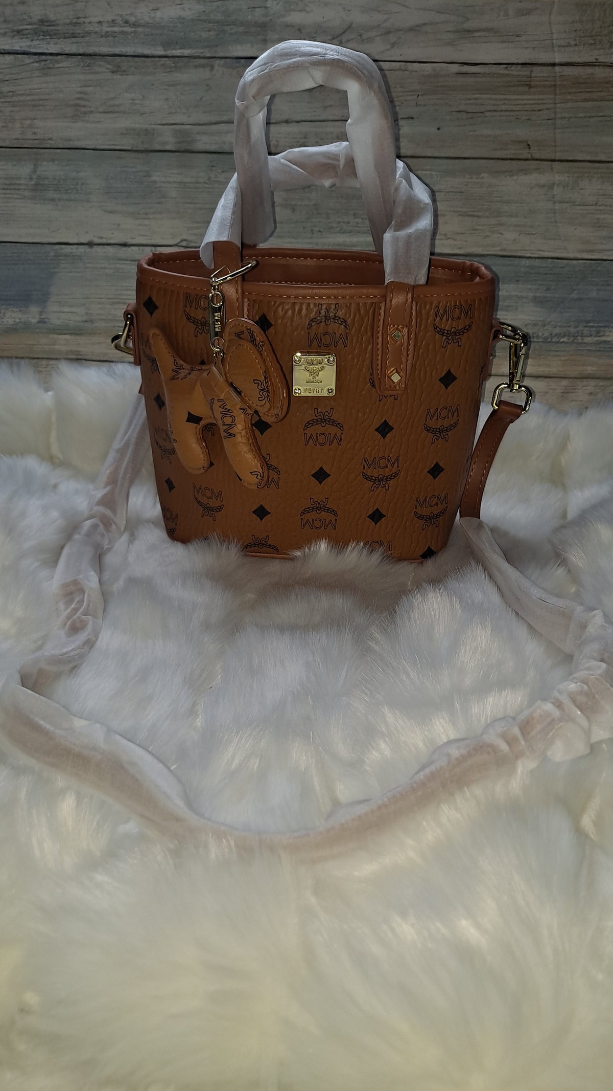M(M TAN MINI CROSSBODY BAG