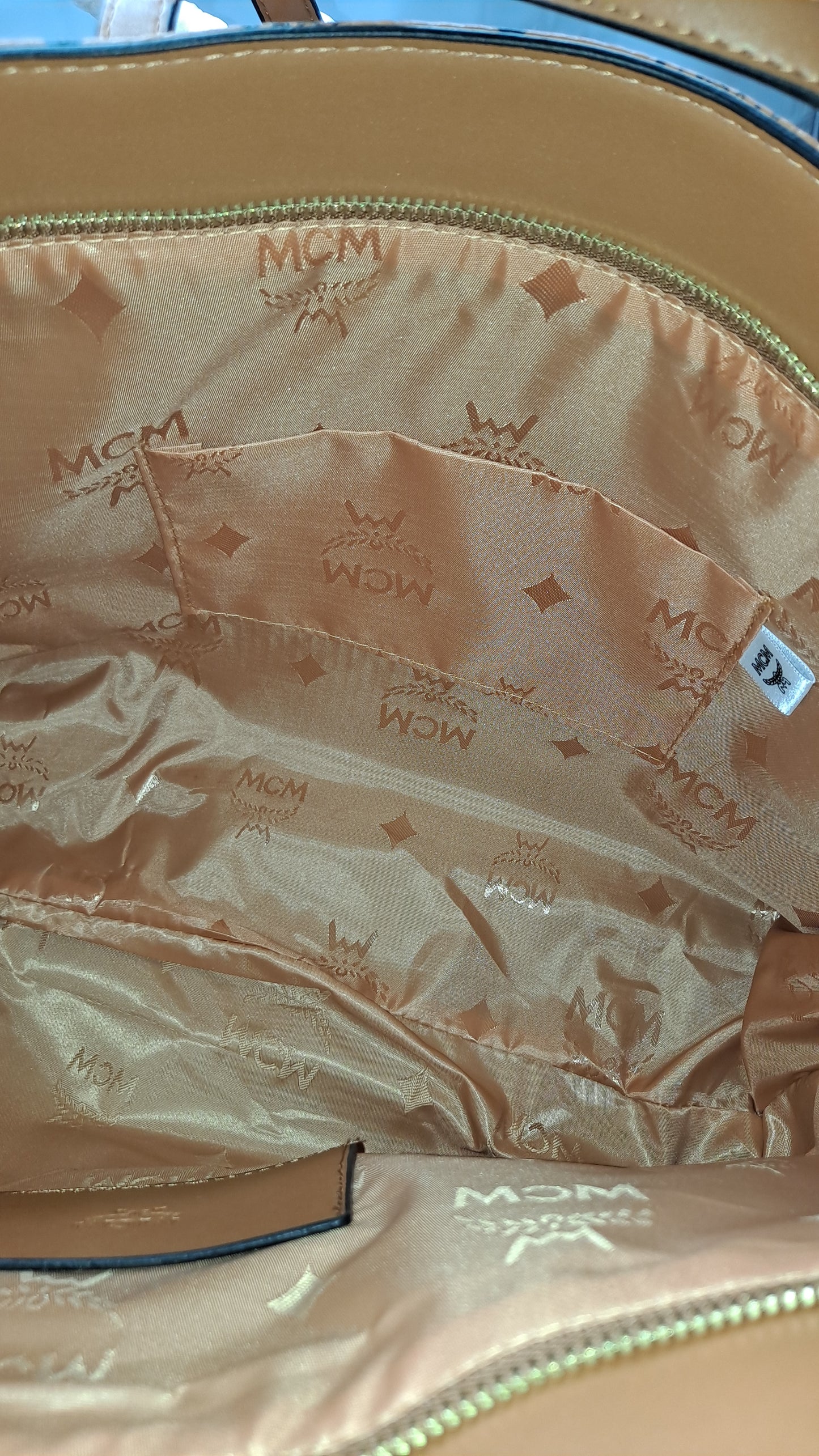 MC NEVERFULL BAG & WRISTLET CLEARANCE