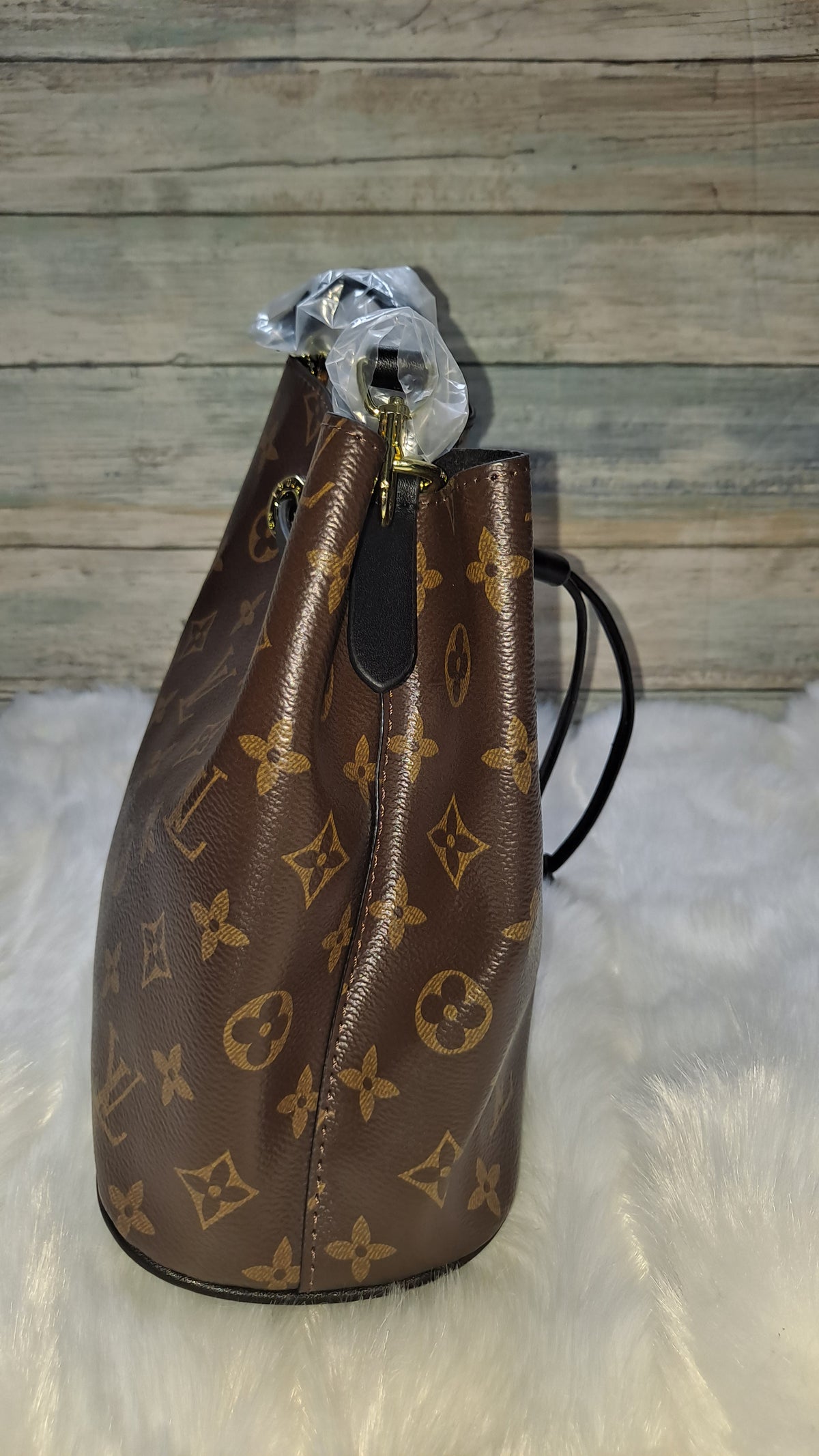 LOUISV BUCKET CROSSBODY BAG