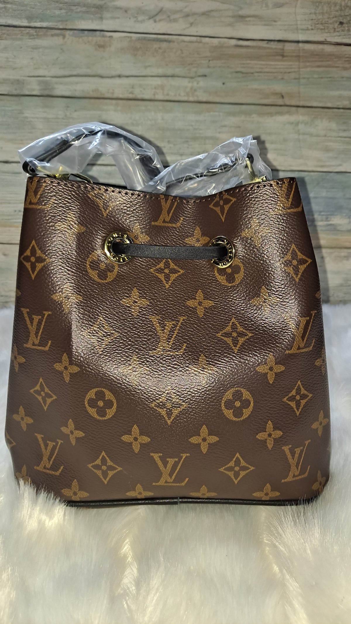 LOUISV BUCKET CROSSBODY BAG