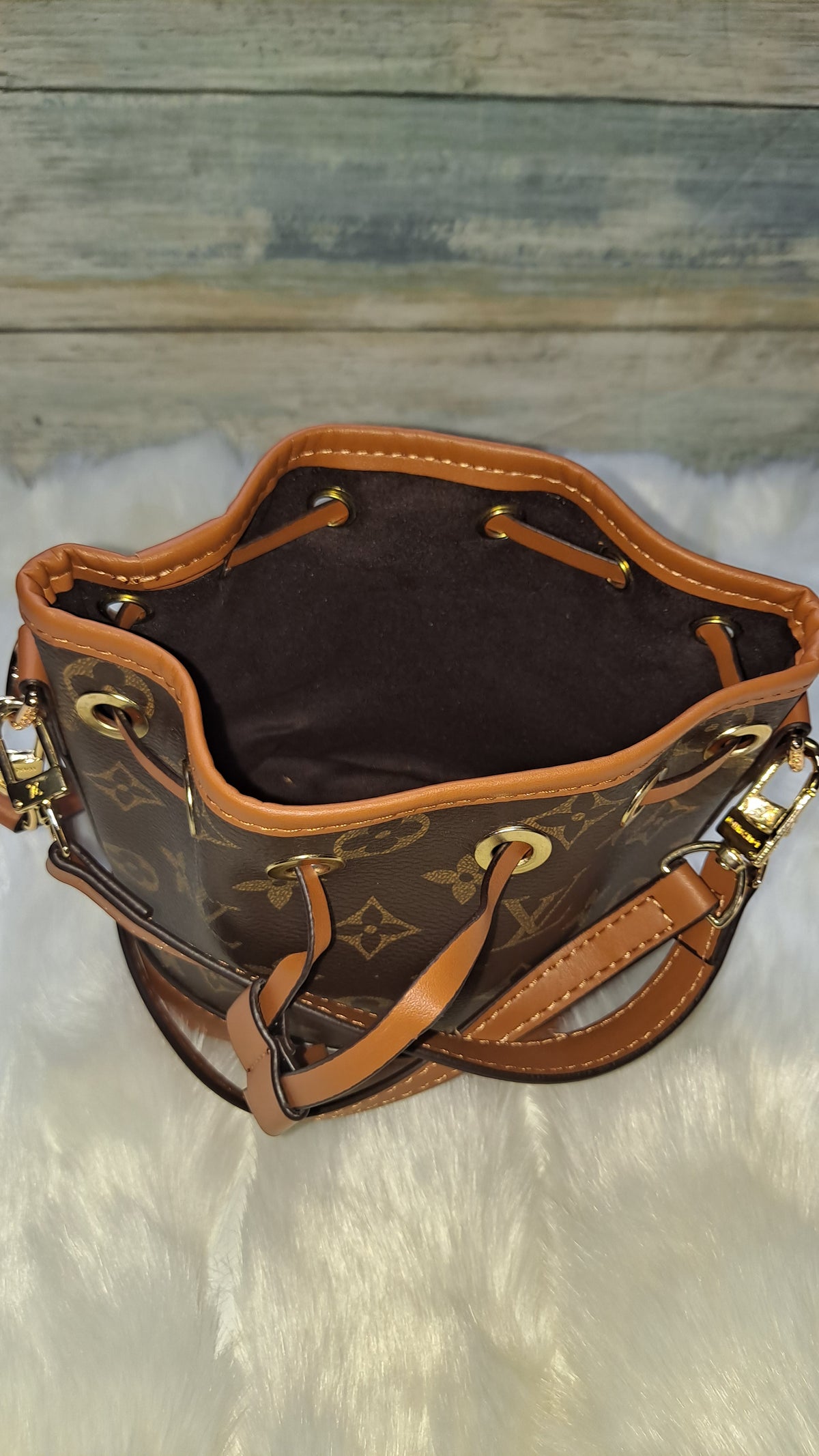 LOUISV MINI BUCKET CROSSBODY BAG