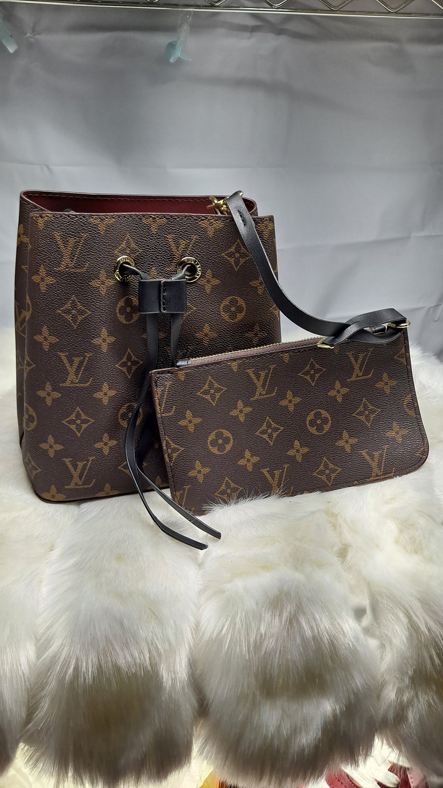 LV BUCKET CROSSBODY BAG