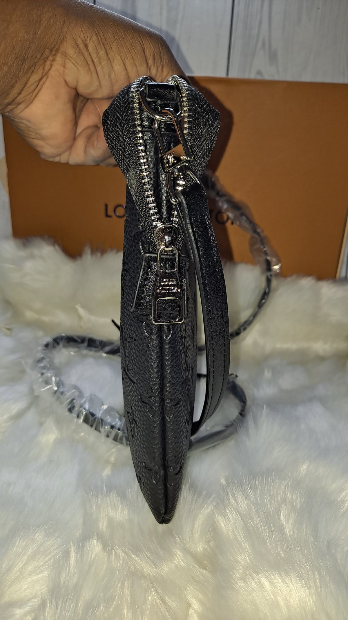 LOUISV BLACK EMBOSSED FLAT CROSSBODY BAG