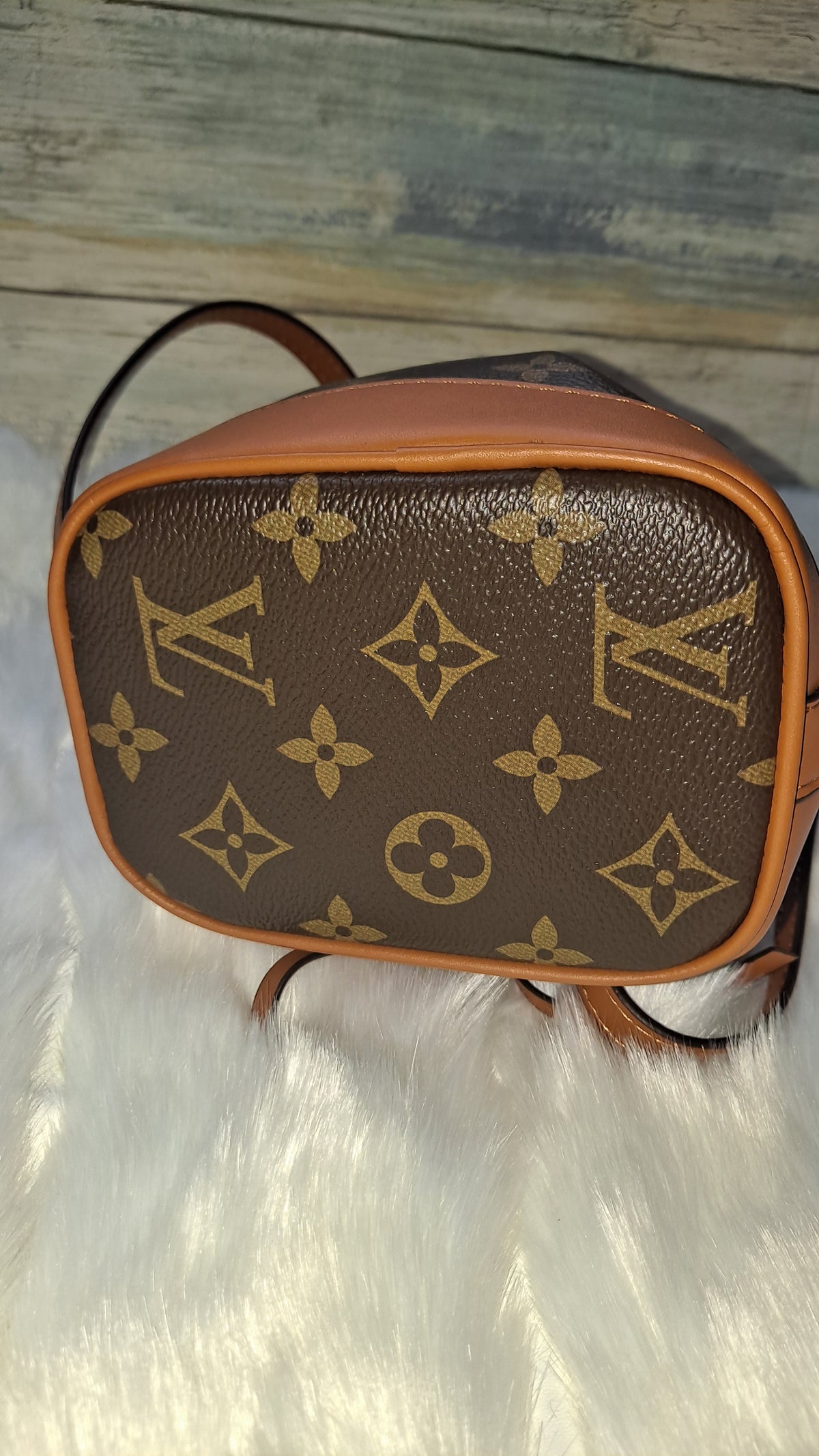 LOUISV MINI BUCKET CROSSBODY BAG