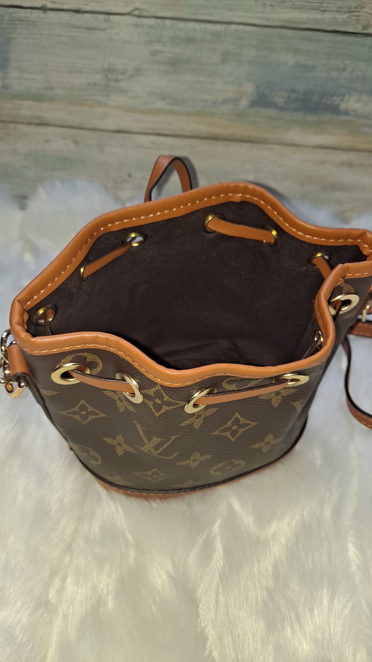 LOUISV MINI BUCKET CROSSBODY BAG