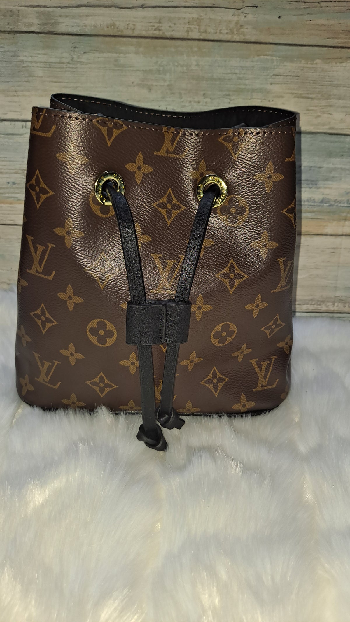 LOUISV BUCKET CROSSBODY BAG