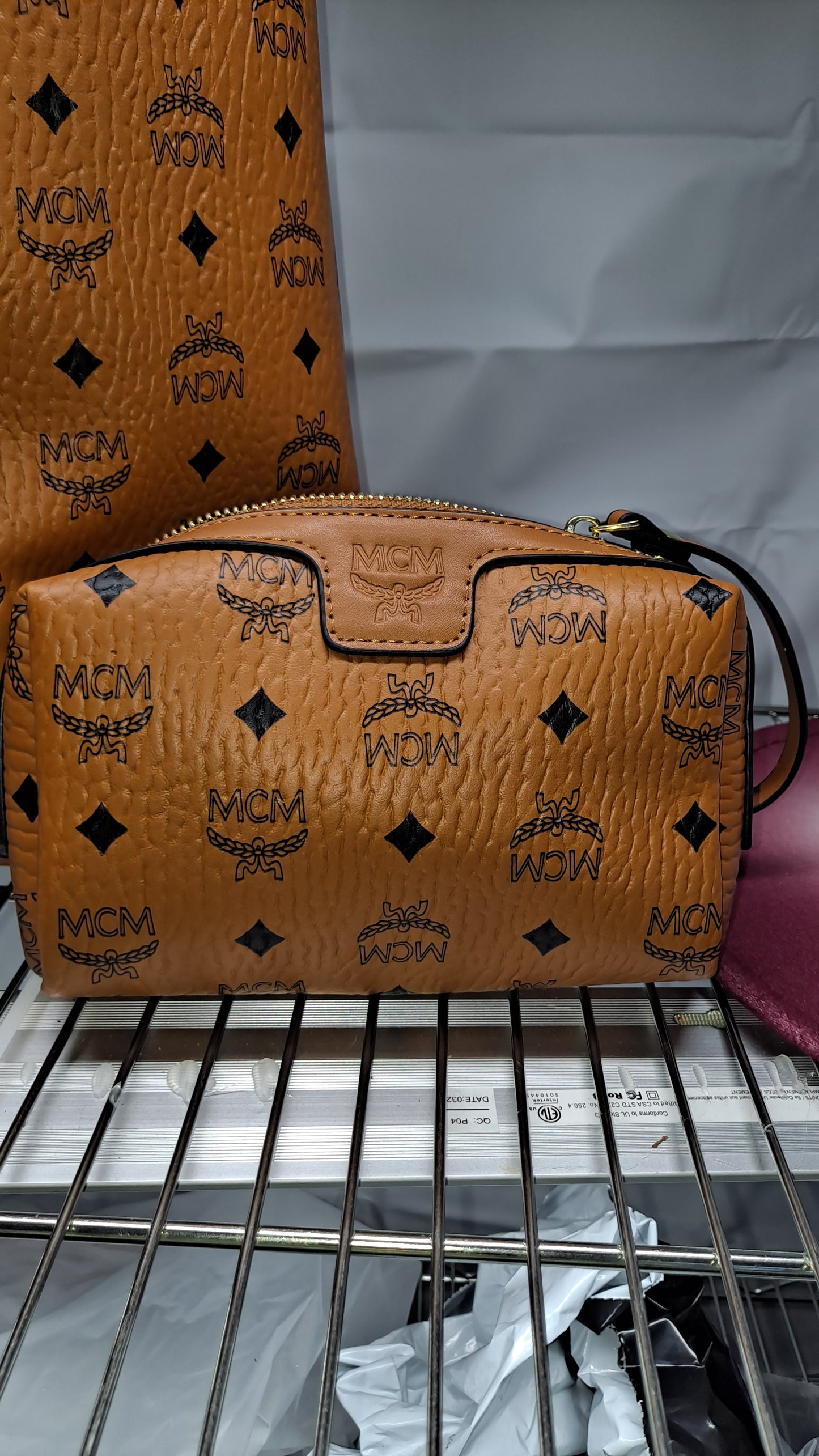 MC NEVERFULL BAG & WRISTLET CLEARANCE